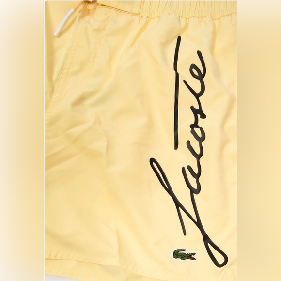 Lacoste Men's Yellow Solid Elastic Waist Swim Shorts Trunks - Picture 3 of 4
